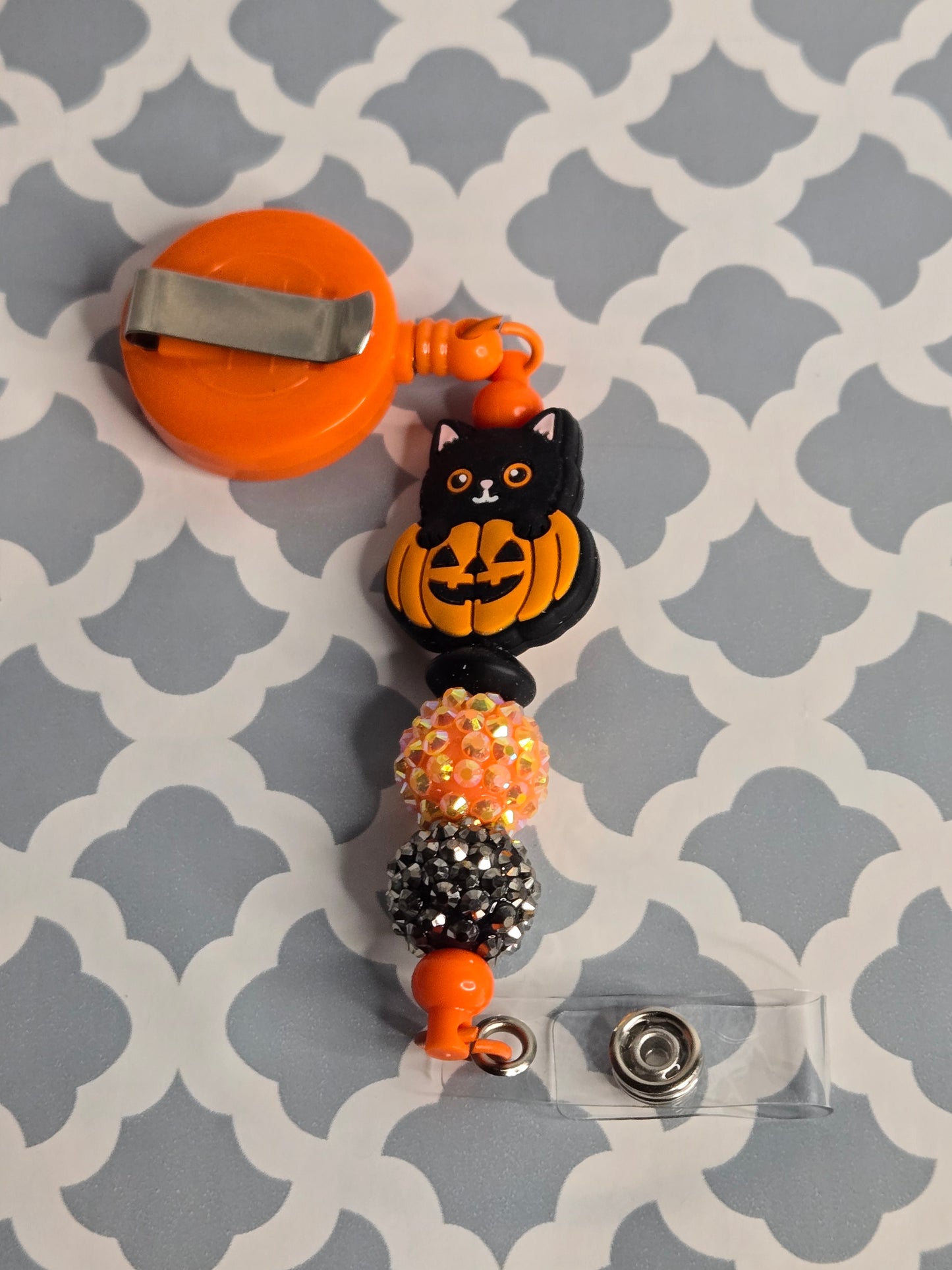 Cat in Pumkin beaded badge reel