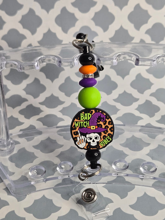 Bad witch beaded badge reel