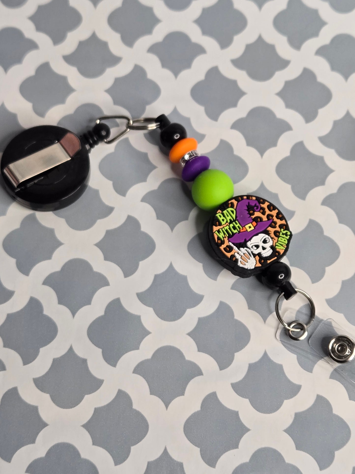 Bad witch beaded badge reel