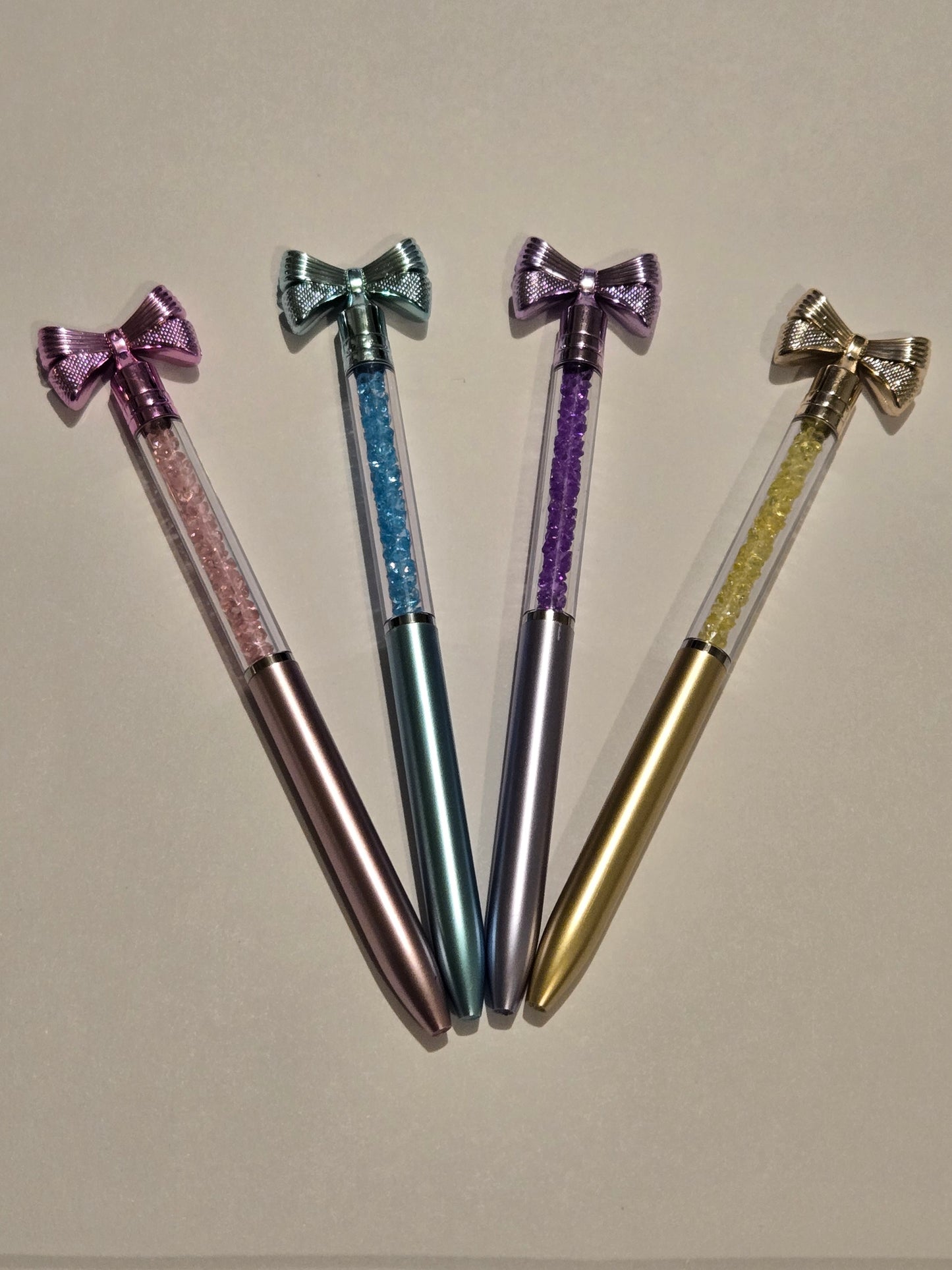 Bow shaker style pens